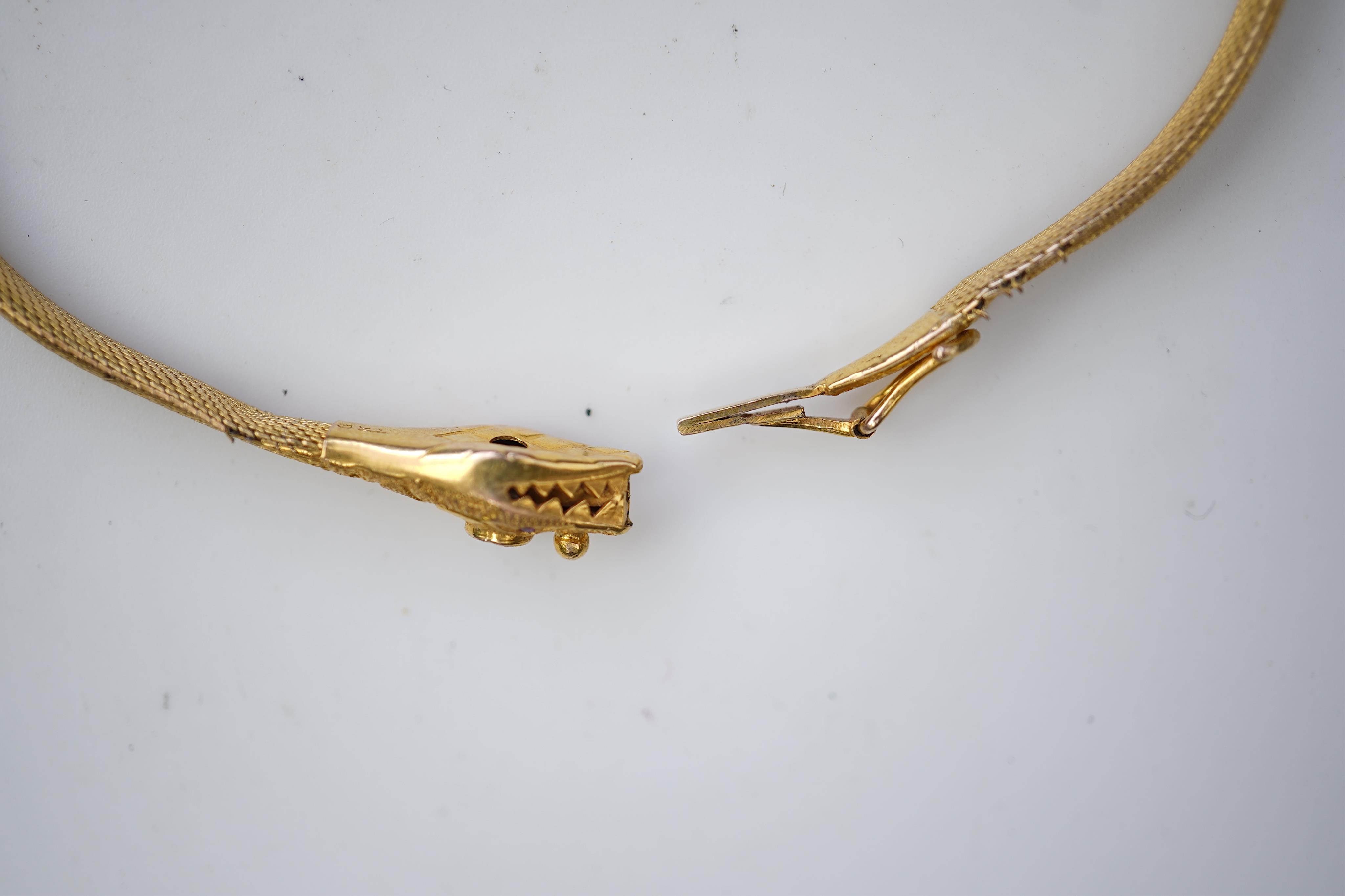 A Victorian gold, ruby and sapphire bracelet, mid 19th century